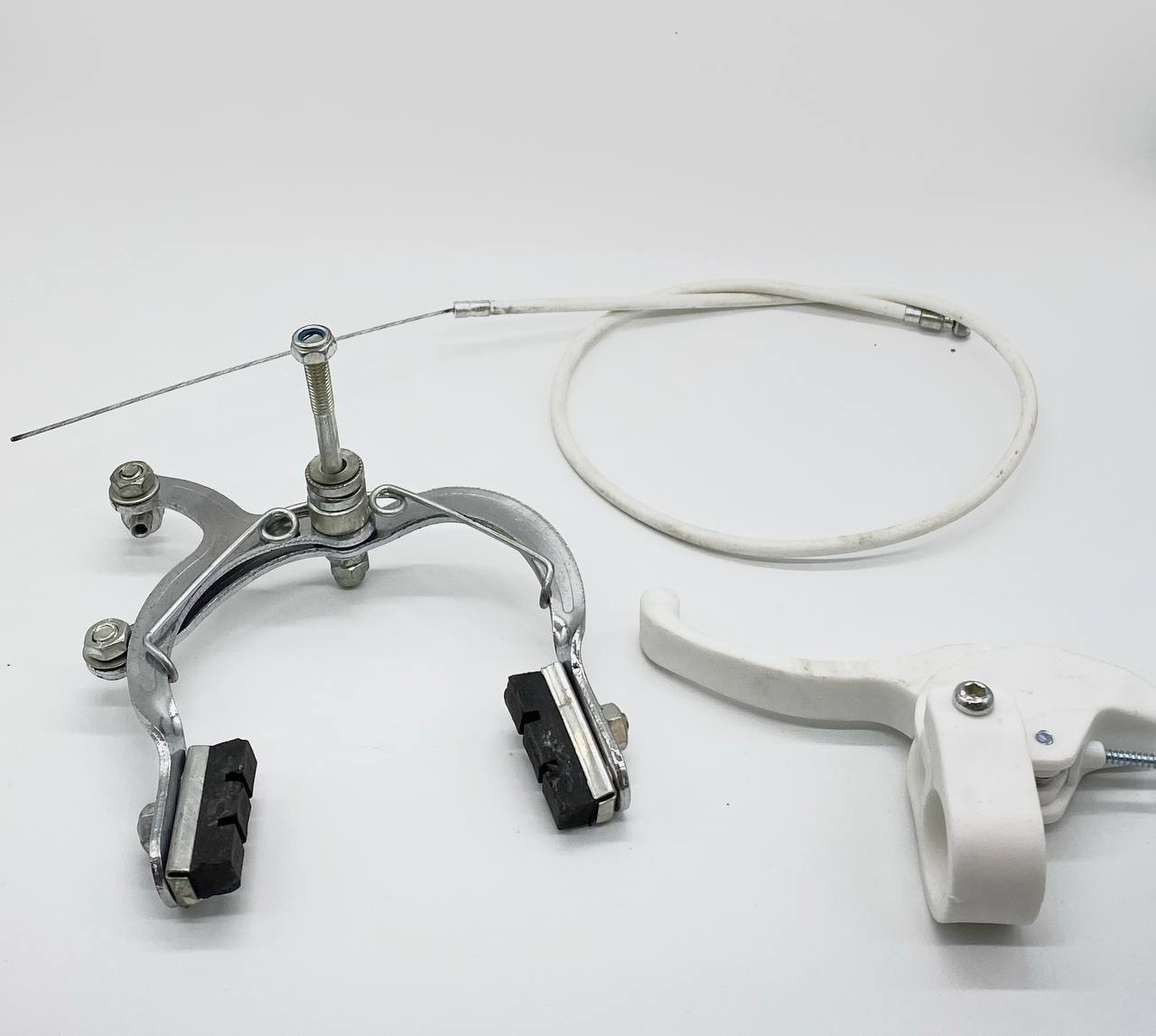 Ручне гальмо для велосипеда  (у комплекті ручка, трос,гальмо) білого коліру (шт.)