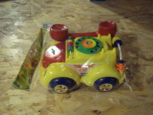 Каталка 705 Р (60шт) телефон, у кульку, 22-14см (шт.)