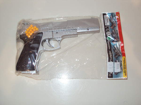 Пістолет 363 (600шт) на кульках, 13см, у пакеті, 13-9-2,5см (шт.)